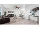 Inviting living room with modern decor, comfortable seating, and an open floor plan at 1499 Janet Pl, Englewood, FL 34223