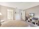 Bedroom features soft neutral colors and adjoins a clean and bright bathroom at 150 James Ct, Oldsmar, FL 34677
