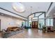 Stunning lobby features soaring ceilings, unique light fixtures, and comfortable seating areas at 150 James Ct, Oldsmar, FL 34677