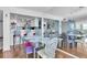 Large dining room near kitchen features a modern table with ample seating, perfect for Gathering dinners at 17408 Gulf Blvd # 1302, Redington Shores, FL 33708