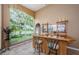 A bar area with counter seating, display shelving, and an expansive lake view at 2042 Diamond Ct, Oldsmar, FL 34677