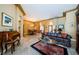 Spacious living room featuring tile floors, comfortable seating, and a seamless dining room transition at 2042 Diamond Ct, Oldsmar, FL 34677