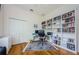 Functional home office with built-in bookshelves, workspace, and ample storage, ideal for productivity at 2042 Diamond Ct, Oldsmar, FL 34677