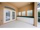Outdoor patio with a wet bar, cabinets and glass block windows at 2042 Diamond Ct, Oldsmar, FL 34677