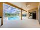 Covered pool patio with great views and serene landscaping at 2042 Diamond Ct, Oldsmar, FL 34677