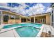 Beautifully designed outdoor pool and hot tub area with access to the home at 2042 Diamond Ct, Oldsmar, FL 34677