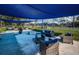 Outdoor seating with plush chairs under a covered awning for relaxation and community engagement at 2042 Diamond Ct, Oldsmar, FL 34677