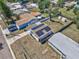 Aerial view of the property featuring solar panels on the roof and fenced in backyard at 2639 28Th N Ave, St Petersburg, FL 33713