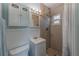 Cozy bathroom featuring a stand up shower, vanity, and cabinet with mirror at 2639 28Th N Ave, St Petersburg, FL 33713
