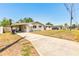 Single-story home with a cozy carport, level lot, and convenient, long driveway at 2639 28Th N Ave, St Petersburg, FL 33713