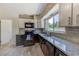 Stylish kitchen with modern appliances, granite countertops, and ample natural light at 2639 28Th N Ave, St Petersburg, FL 33713