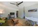 Inviting living room with a ceiling fan, a television, a modern table and stylish decor at 2639 28Th N Ave, St Petersburg, FL 33713