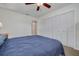 Bedroom featuring closet and overhead light at 2671 Clubhouse N Dr, Clearwater, FL 33761