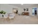 Additional living space with carpeted floors, modern furnishings, and a cozy atmosphere at 2671 Clubhouse N Dr, Clearwater, FL 33761