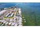 Waterfront homes featuring boat docks and nearby amenities like shopping, dining and beaches at 2675 St Josephs E Dr # C, Dunedin, FL 34698
