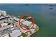Waterfront home featuring lush tropical landscaping and a private dock with gulf access at 2675 St Josephs E Dr # C, Dunedin, FL 34698