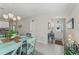 Inviting dining area adjacent to the front door and kitchen space at 2821 Lytton Hall Dr, Zephyrhills, FL 33540