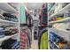 Spacious walk-in closet with organized shelving, offering ample storage for clothing and shoes at 305 Bryan Oak Ave, Brandon, FL 33511
