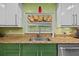 Well-equipped kitchen with granite countertops, stainless appliances, and bright natural light at 305 Bryan Oak Ave, Brandon, FL 33511