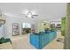Bright, open living area with hardwood floors and views into the modern kitchen at 305 Bryan Oak Ave, Brandon, FL 33511