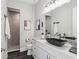 Modern bathroom with vanity, large mirror, and glass shower at 32860 Drake Estates Way, Dade City, FL 33525