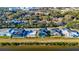 A scenic view of waterfront homes, with swimming pools, in a peaceful, established neighborhood at 3420 Channelside Ct, Safety Harbor, FL 34695
