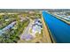 A waterfront community featuring modern homes along a scenic canal with lush landscaping at 3420 Channelside Ct, Safety Harbor, FL 34695