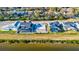 Aerial view of waterfront homes, one of which has a foundation ready for construction at 3420 Channelside Ct, Safety Harbor, FL 34695