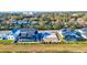 A picturesque street with new construction and waterfront views offers modern living and serene surroundings at 3420 Channelside Ct, Safety Harbor, FL 34695