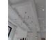 White ceiling with elegant lighting fixtures at 3420 Channelside Ct, Safety Harbor, FL 34695