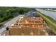 Aerial view of new home construction and waterfront homesites in the community at 3420 Channelside Ct, Safety Harbor, FL 34695