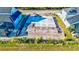 An aerial view of a new home concrete foundation with stub outs for plumbing on a water view lot at 3420 Channelside Ct, Safety Harbor, FL 34695