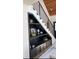 Unique staircase with display shelving for decor, offering stylish storage space at 3420 Channelside Ct, Safety Harbor, FL 34695