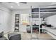 bedroom featuring a modern bunk bed, a ladder bookshelf and a gray ottoman at 349 Belleair Ne Dr, St Petersburg, FL 33704