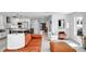 Bright open living space with white walls and tile flooring leading to the front door at 349 Belleair Ne Dr, St Petersburg, FL 33704