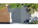 An aerial view of the home showcasing the roof and surrounding landscaping at 3512 Haines N Rd, St Petersburg, FL 33704