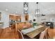 Spacious kitchen features an island with bar seating, stainless steel appliances, and opens to a dining area at 3710 W San Pedro St, Tampa, FL 33629
