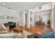 Inviting living room featuring hardwood floors, an open floor plan, high ceilings, and natural light at 3710 W San Pedro St, Tampa, FL 33629