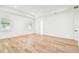 Spacious bedroom with wood floors, recessed lighting, and a neutral color palette at 3821 W Vasconia St, Tampa, FL 33629