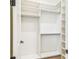 Organized closet with shelving and hanging rods, ready for ample storage at 3821 W Vasconia St, Tampa, FL 33629