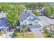 Aerial view of a two-story home with a well-manicured lawn and an attached two-car garage at 3821 W Vasconia St, Tampa, FL 33629