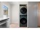 Convenient laundry room with stacked washer and dryer units, offering functionality and space-saving design at 422 24Th N St, St Petersburg, FL 33713