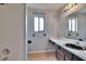 Bathroom featuring modern fixtures, bright vanity and ample space at 4225 Barret Ave, Plant City, FL 33566