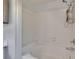 Bathtub with white tile and detachable shower head at 4225 Barret Ave, Plant City, FL 33566