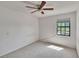 Neutral bedroom with a ceiling fan and lots of natural light at 4225 Barret Ave, Plant City, FL 33566