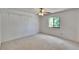 Bedroom features neutral paint, carpeting and a ceiling fan at 4225 Barret Ave, Plant City, FL 33566