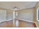 Spacious bedroom with hardwood floors, ceiling fan, neutral paint and ample natural light at 4225 Barret Ave, Plant City, FL 33566