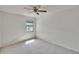 Neutral bedroom with a ceiling fan and lots of natural light at 4225 Barret Ave, Plant City, FL 33566