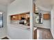 Kitchen with a breakfast bar featuring stainless steel appliances and wood cabinets at 4225 Barret Ave, Plant City, FL 33566