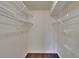 Walk-in closet with built-in shelving units at 4225 Barret Ave, Plant City, FL 33566